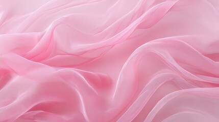 Obraz premium Light filters through delicate soft pink fabric casting a gentle glow and creating a calm mood.