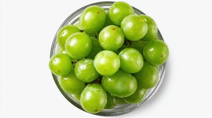 A bowl filled with vibrant green grapes showcases their glossy skin and fresh appearance.