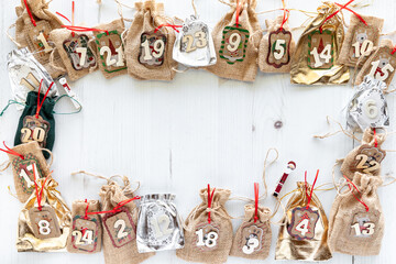 An assortment of gift pouches for a DIY Advent Calendar with copy space.