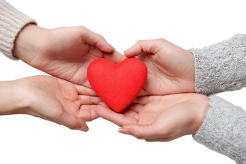 Fototapeta premium Two hands gently holding a red heart