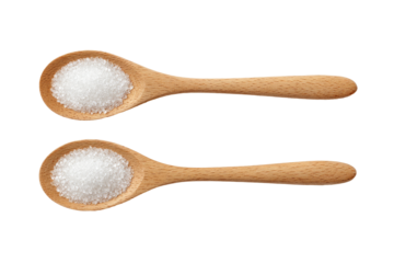 Two wooden spoons, filled with white granular substance (2)