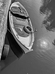 Ostia, Rome, Italy - September 5, 2025, a fisherman's boat docked along the Fishermen's Canal.