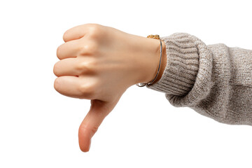 A hand showing a thumbs-down gesture.  Light-skinned hand with a neutral-toned, textured sweater sleeve.  Close-up