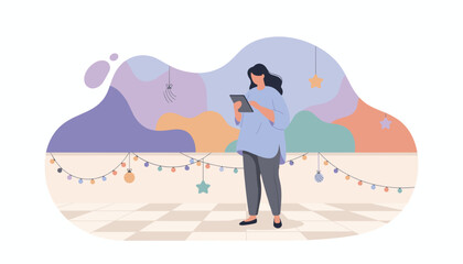 Woman using tablet to manage events or party planning with festive string lights decoration