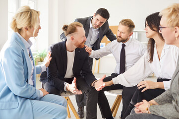 Diverse people group gathered in circle at workplace office, share, discuss work or problems,...