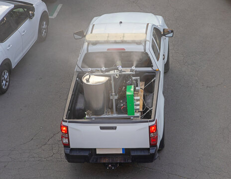 Aerial View of Truck Spraying Mosquitoes Insects Control Specialized Vehicle at Street