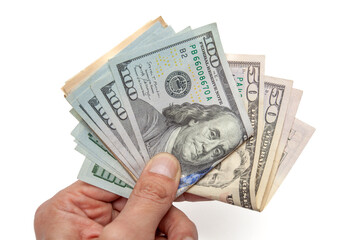 Hand Holding a Stack of High Denomination US Dollar Bills