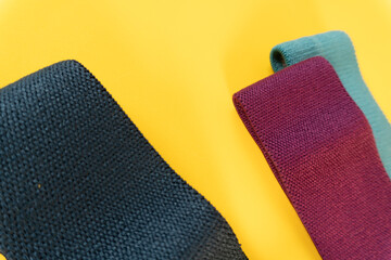 Approach to exercise bands, yellow background