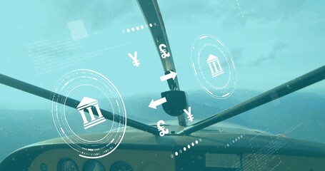 Showing cockpit panel and windshield struts flying over mountain peaks, with HUD financial icons
