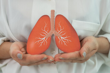 Human hand hold care lung health therapy ,respiratory disease ,lung cancer ,bronchitis ,Tuberculosis, pneumonia, pulmonary care and medical healthcare, eco air pollution, insurance and hospital