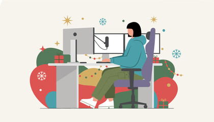 Creator working on a computer in a festive Christmas decorated home office setup