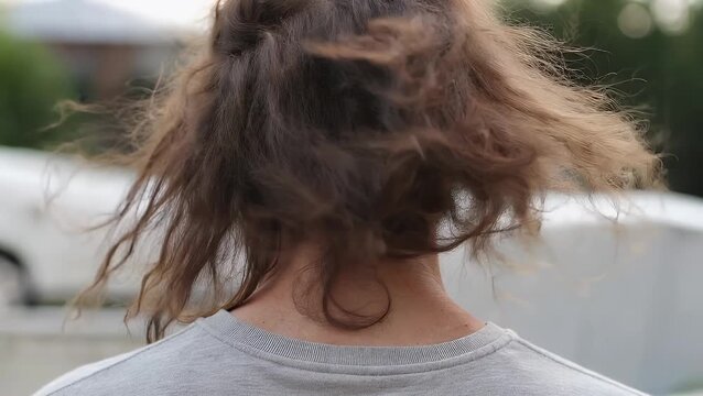 State of Highly Unkempt and Tangled Brown-Colored Hair  Representing a Difficult Hair Management Day  Illustrated from the Rear