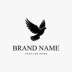 Elegant black and white logo design featuring a flying dove.