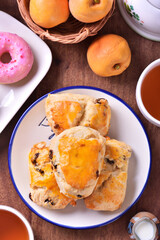 Closeup of a heap of raisin cheese scone  