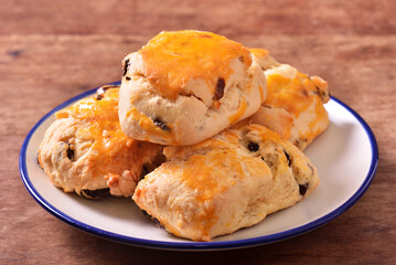 Closeup of a heap of raisin cheese scone  