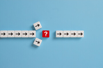 Question mark print screen on red dice cross in the middle of arrow for interrupt of process concept.