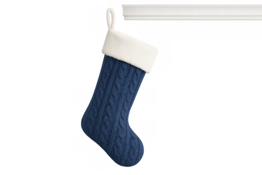 Blue knitted cable christmas stocking hanging from a mantel, ready for holiday gifts, transparent background