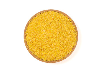 Raw dried millet isolated on white background.top view