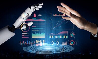 A striking image showcasing the interaction between a human hand and a robotic arm, surrounded by...