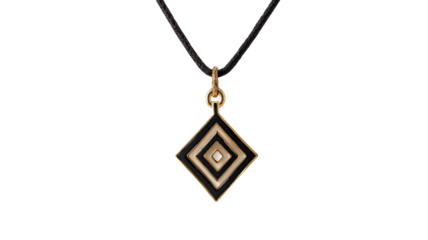 Geometric diamond shaped gold pendant with black enamel pattern on black cord necklace isolated on white background