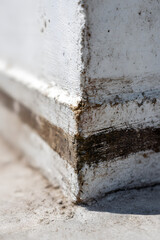 Structural Detail: A close-up showcases the crisp lines and textures of a building's corner, highlighting architectural precision and the effects of time.