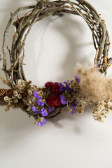 Boho dried flower wreath with fluffy natural accents, grapevine base, wall decor

