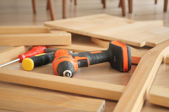 Tools strewn on the floor during assembly