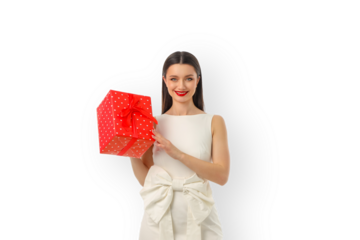 Smiling woman with a red polka dot gift box, isolated, PNG
