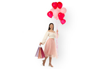 Woman holding colorful balloons and gift bags, isolated, PNG