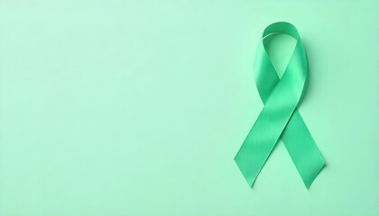 Stethoscope and green awareness ribbon on a green background, highlighting glaucoma awareness and the importance of eye exams