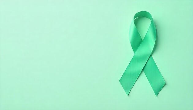 Stethoscope and green awareness ribbon on a green background, highlighting glaucoma awareness and the importance of eye exams - Powered by Adobe