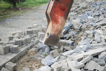 Heavy machinery breaking ground in urban construction site