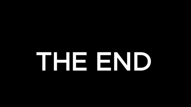 A stark black screen displaying the words the end in bold white lettering centered on the image plane