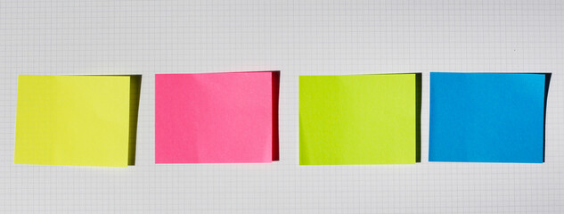 Fototapeta premium Colorful sticky notes on notebook.