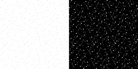 Black background with many scattered white particles