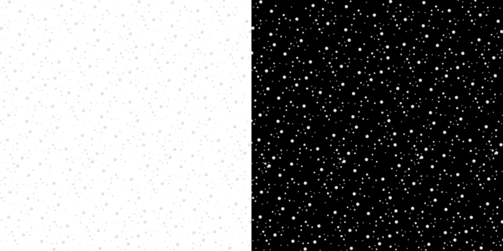 Black background with many scattered white particles
