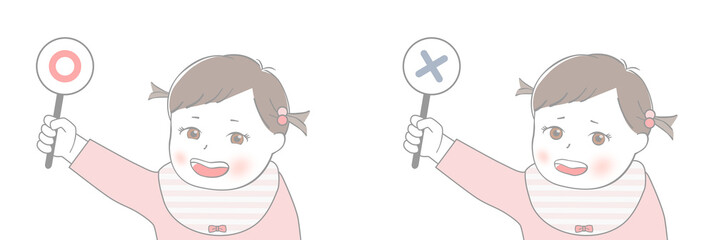 正解と不正解の札を持った赤ちゃん