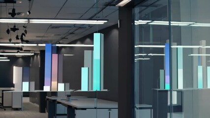 Modern office interior with digital animated graph displays, glass walls, data visualization, blue and bright lighting, minimalistic workspace design - Powered by Adobe