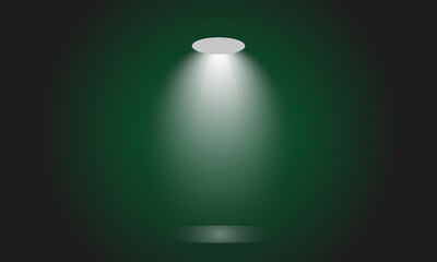 A single spotlight shining brightly on a dark green background