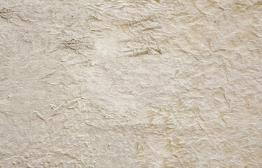 High-quality beige stone surface with organic rough texture and natural detail. Perfect for architectural backgrounds, 3D rendering materials, design mockups, or rustic decoration concepts.