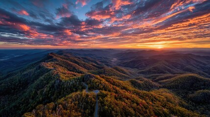 Breathtaking sunrise over green mountains showcasing vibrant colors concept. Breathtaking sunset over rolling hills and autumn foliage.