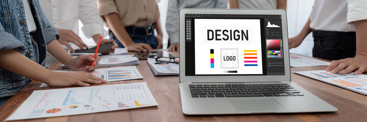 Graphic designer software for modern design of web page and commercial brisk ads showing on the...