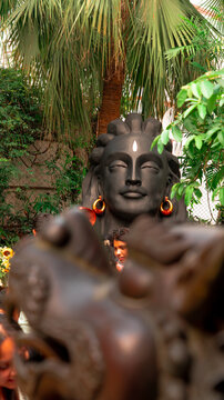 Majestic statue of Adi Shiva captured against a serene background, symbolizing spirituality, meditation, and divine power in Hindu culture.