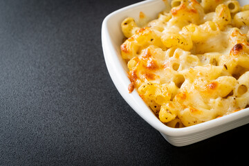 American mac and cheese, macaroni pasta in cheesy sauce