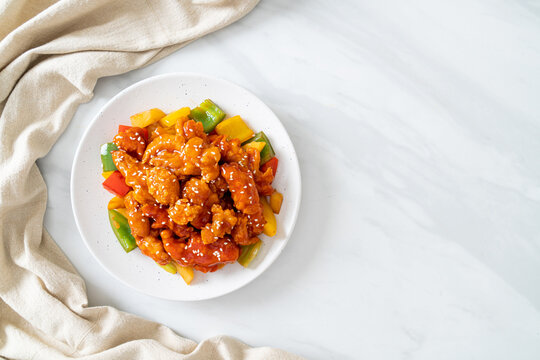 fried crispy chicken with sweet and sour sauce