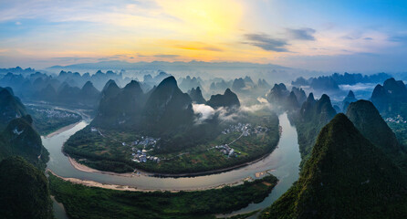 Aerial view of the beautiful karst mountains and river natural landscape at sunrise in Guilin, China.