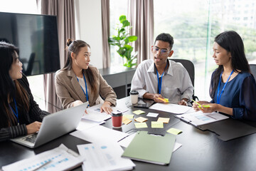Business asian Multicultural businesspeople working project  working together in office conference ideas in startup at office Diversity leadership and business people