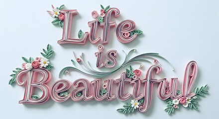 Pastel pink and cream 3D quilled typography “Life is Beautiful” with delicate floral details.
