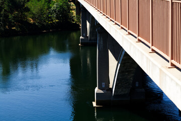 Tight Shot Of Bridge Supports In River Folsom California