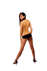 Young Topless Caucasian Woman Standing With Back To Camera